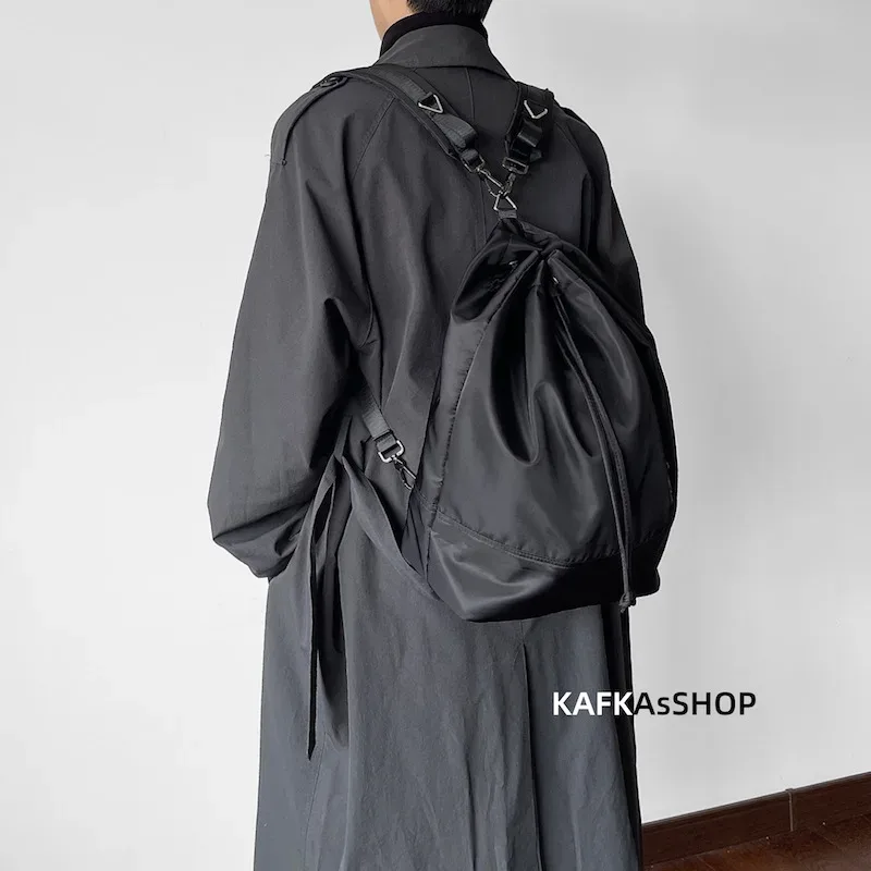 sac à dos seau tendance coréen de style neutre, double usage, sac à bandoulière, texture premium, grande capacité, sac à dos unisexe pour la journée