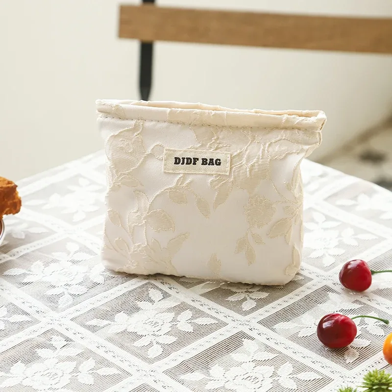 nouveau sac cosmétique femme de petite taille portable bleu broderie mini sac de rangement de serviettes hygiéniques sac de clé de monnaie de banlieue sac de carte bancaire