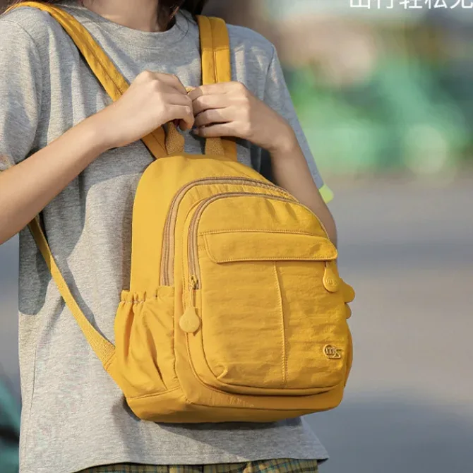 nouveau sac à dos léger et compact, minimaliste et tendance, résistant à l'eau, polyvalent pour les voyages, le sport, l'école et l'usage quotidien