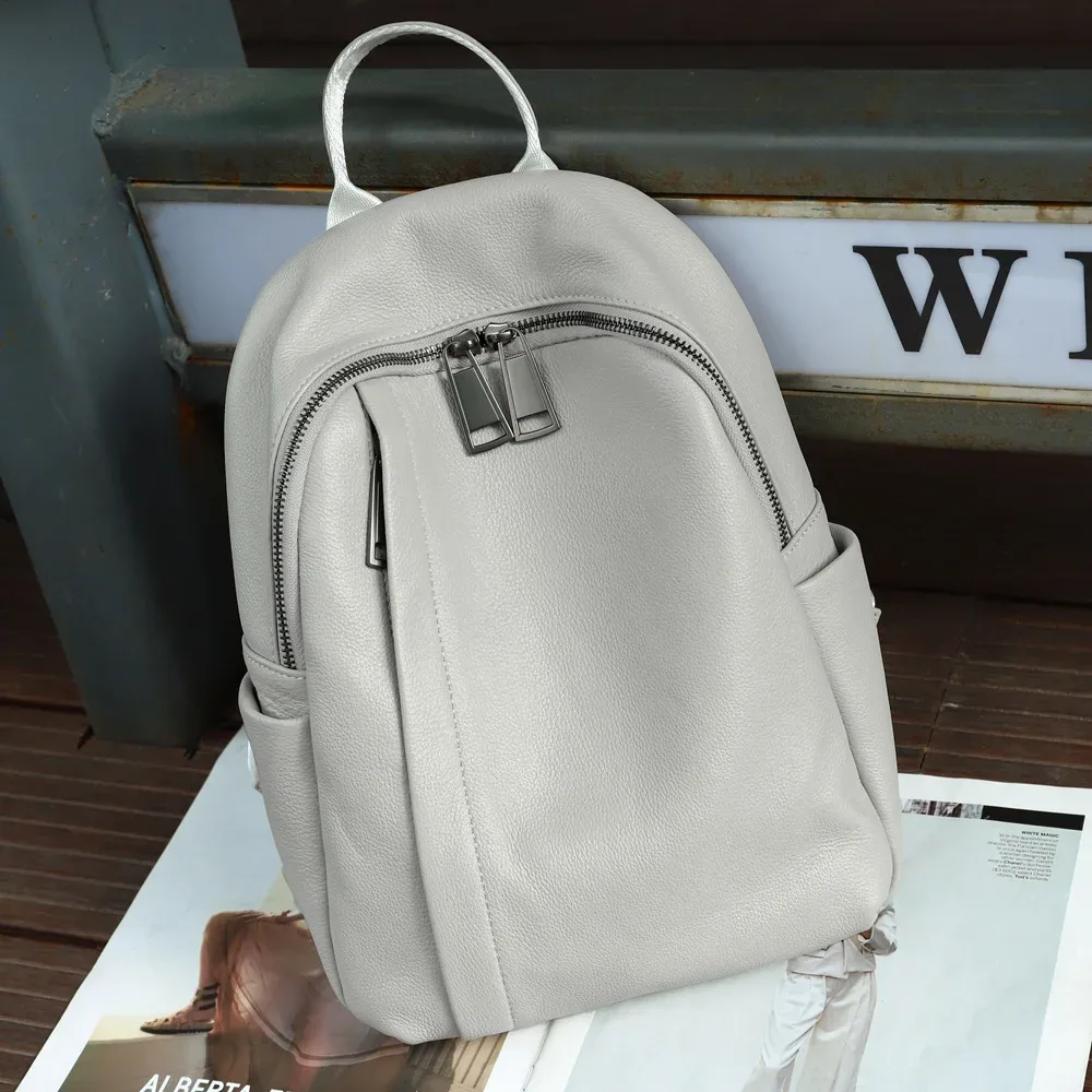 sac à dos en cuir véritable pour femmes, sac à bandoulière d'école à la mode pour dames, sac de voyage en cuir de vache à motif solide, nouvelle collection 2025