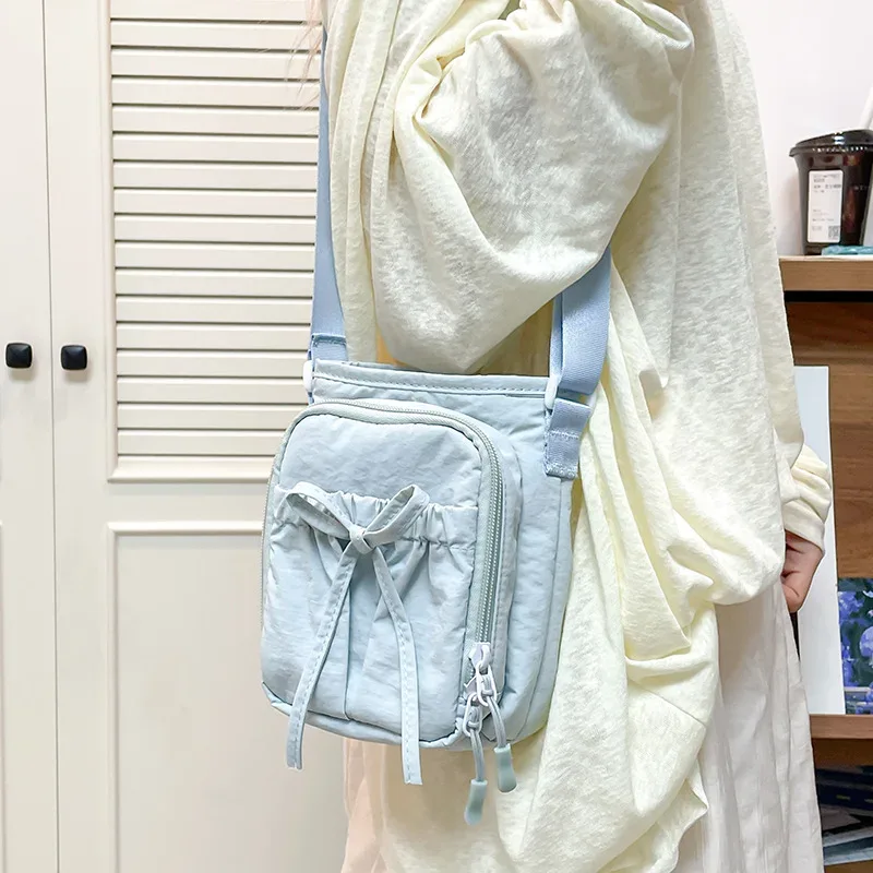 Nouveau sac bandoulière léger pour téléphone portable pour femme, sac de sport extérieur, sac de cyclisme, porte-bouteille d'eau, sac de voyage, design à nœuds