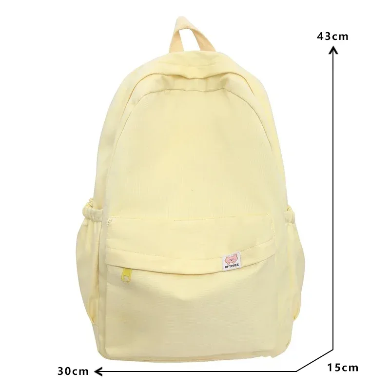 nouveau sac à dos imperméable en nylon pour femmes, sac de voyage, cartable pour adolescentes, sac à livres de couleur unie