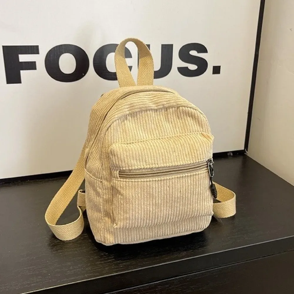 mini sac à dos en velours côtelé de couleur unie, style coréen, avec fermeture éclair, multi-poches, double bandoulière, sac à dos portable vintage pour le collège