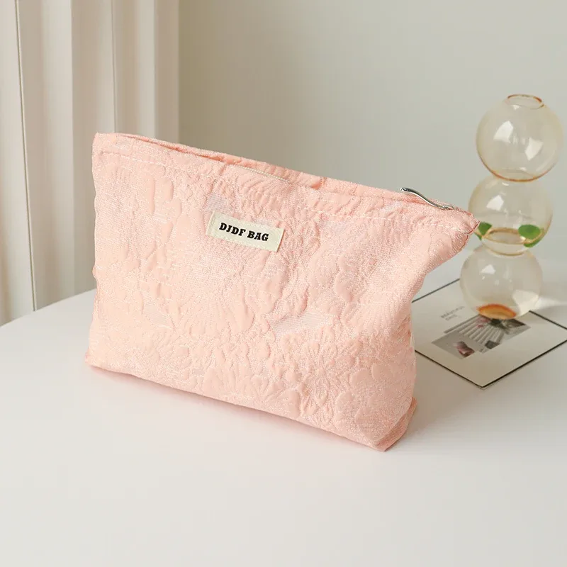 sac à cosmétiques en relief rose noir pour femmes, sac de voyage portable, sac de rangement de changement de cosmétiques de grande capacité, pochette de banlieue