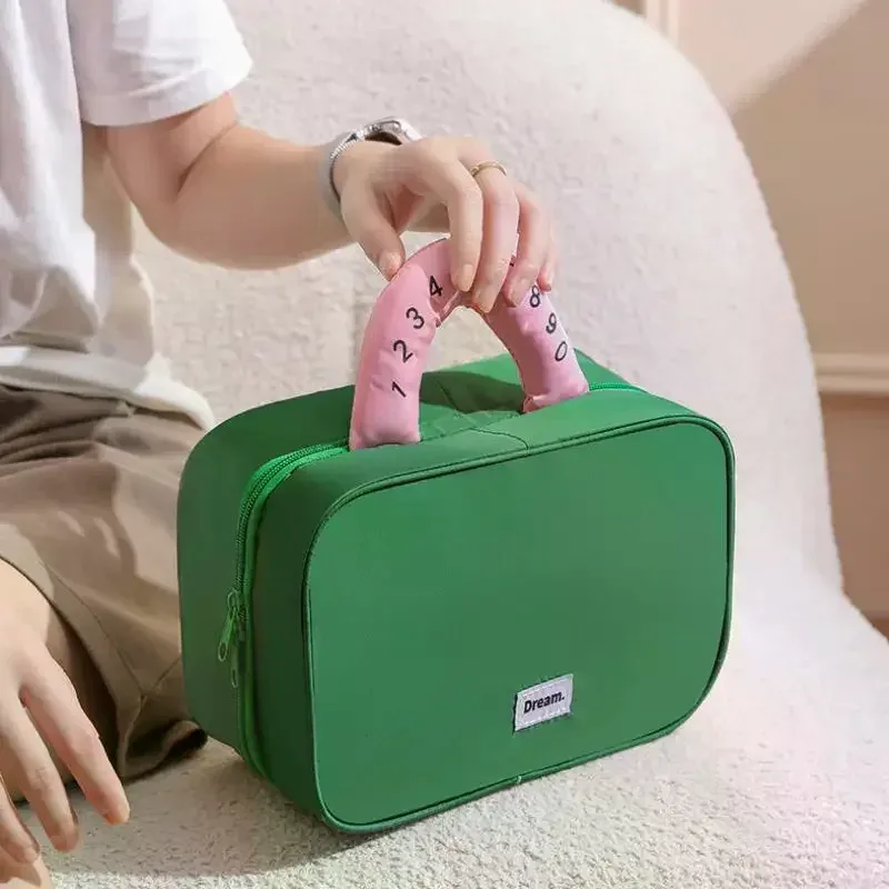trousse de maquillage pliable de haute valeur esthétique avec crochet, sac de rangement de voyage de grande capacité, trousse de toilette portable pour voyage