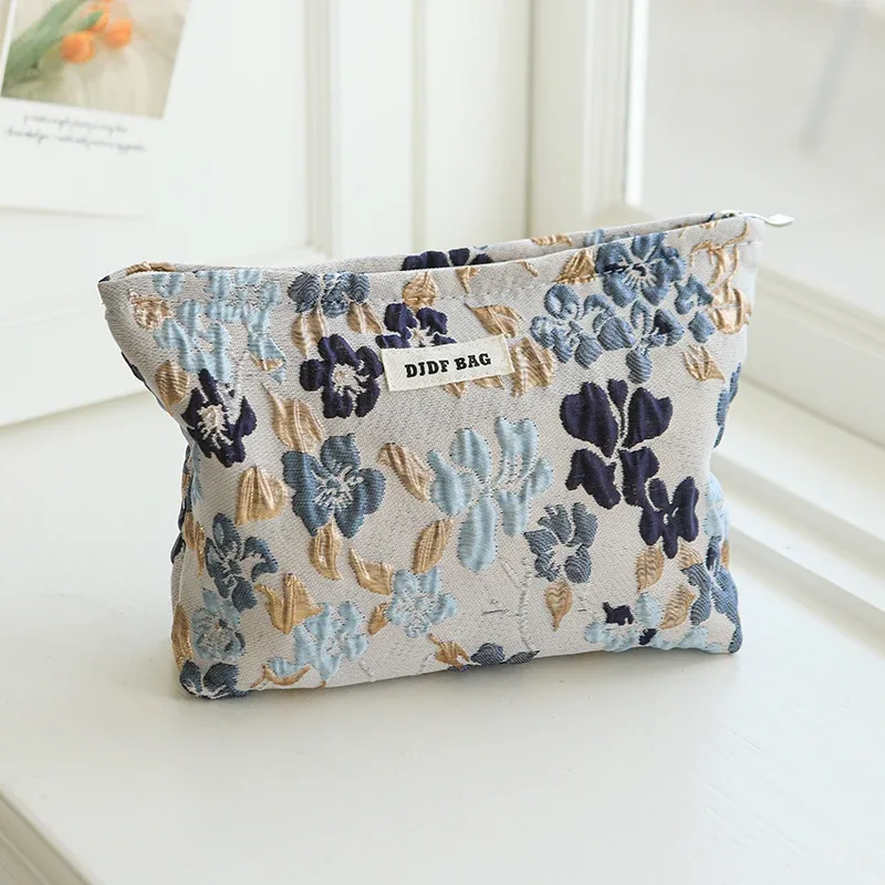 sac de maquillage pour femmes, marguerite brodée blanche, porte-monnaie portable, étui pour clés, cosmétiques, rouge à lèvres, sac de rangement, sac de doublure de banlieue ins