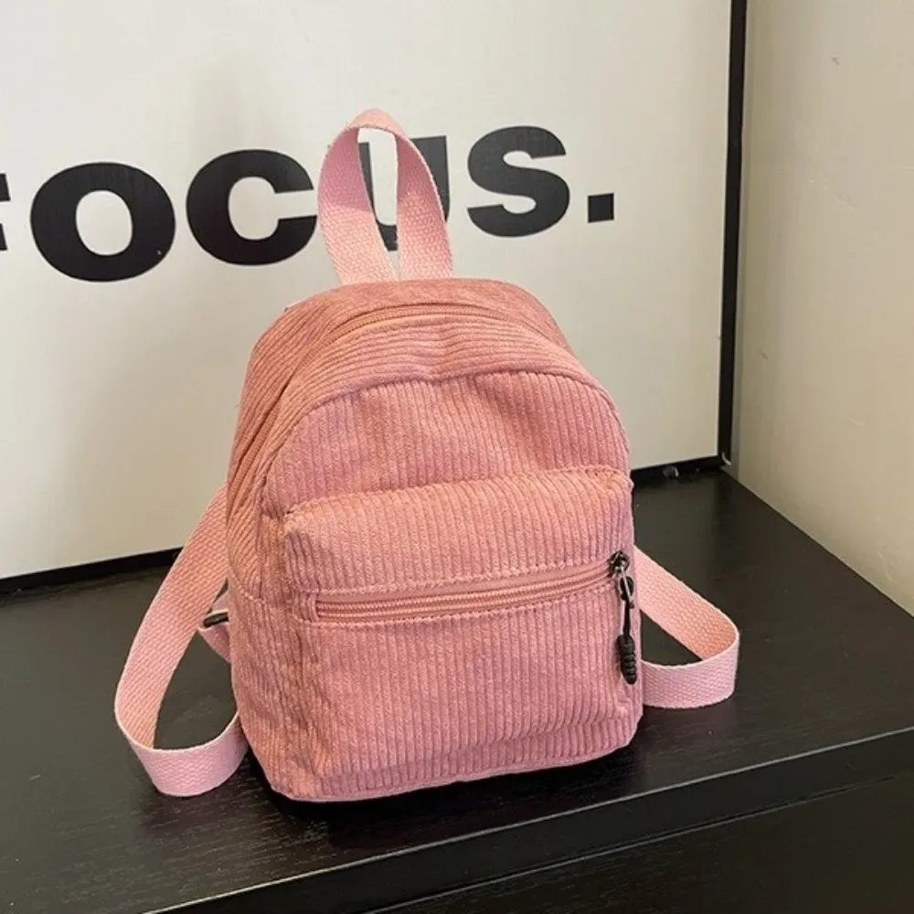 mini sac à dos en velours côtelé de couleur unie, style coréen, avec fermeture éclair, multi-poches, double bandoulière, sac à dos portable vintage pour le collège