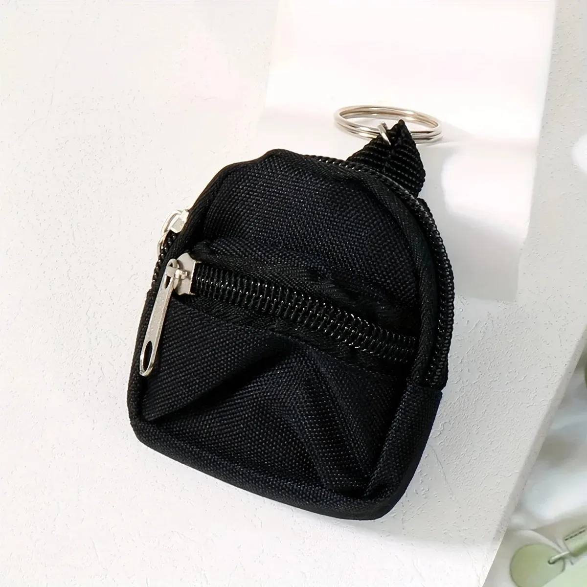mini sac à dos porte-monnaie porte-clés avec deux poches zippées, pochette de rangement fonctionnelle pour petits essentiels, joli accessoire de sac pour le quotidien
