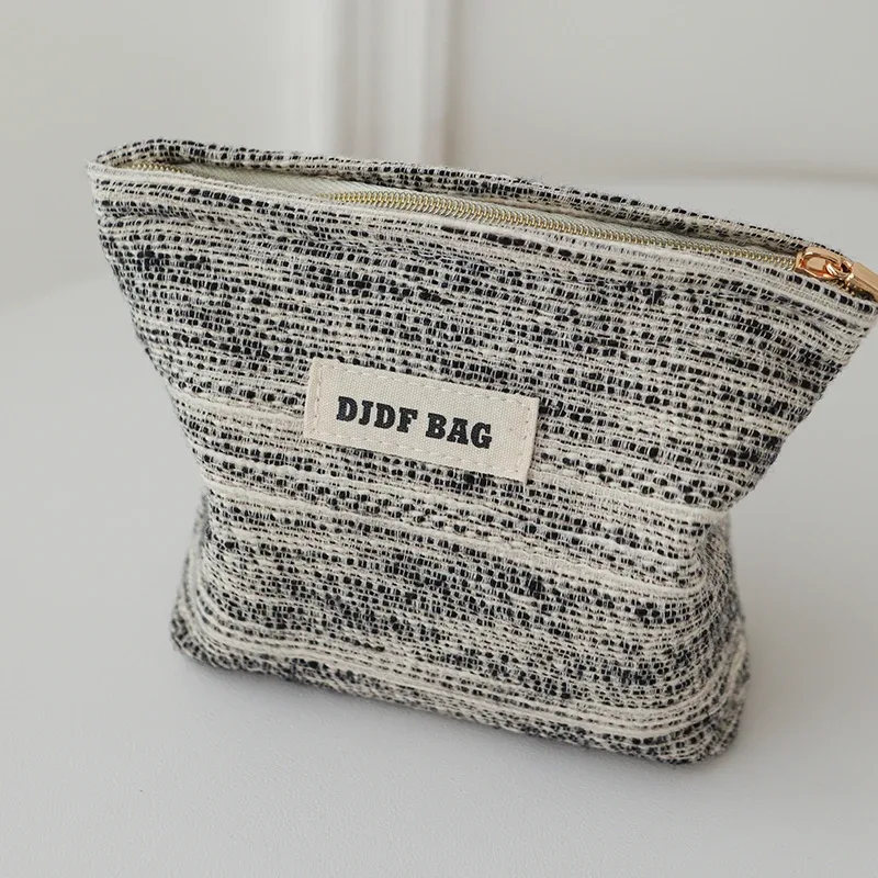 djdf – petit sac de maquillage pour femmes, ligne noir et blanc, sac de rangement de serviettes hygiéniques portables en toile avec fermeture éclair, porte-monnaie simple à main