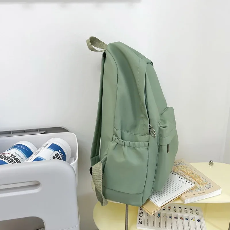 sac à dos décontracté simple de couleur unie, léger et pour lycéen, sac à dos multifonctionnel adapté aux voyages et à l'école