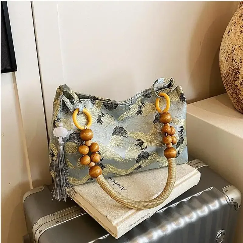 hasp fil à coudre brodé style national sacs à bandoulière gland décoration 2025 printemps nouvelle offre spéciale sacs à main pour femmes