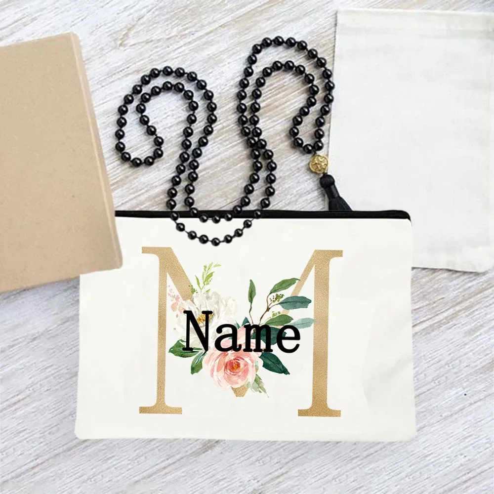 pochette en toile personnalisée avec initiales florales dorées, trousse de toilette légère personnalisée avec monogramme pour femmes, idéale pour les voyages quotidiens.