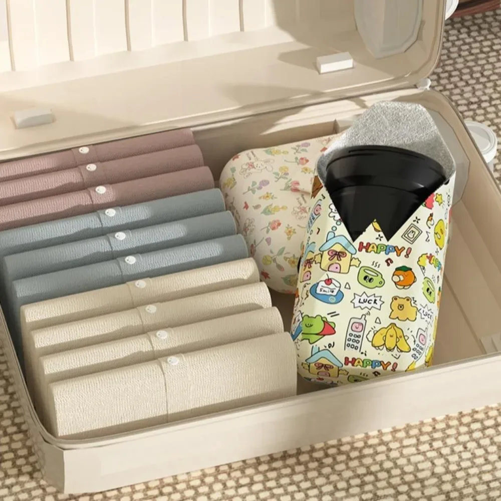 nouveau fantastique sac cosmétique pliant tissu magique cent patch tissu caméra pour ipad sac de rangement