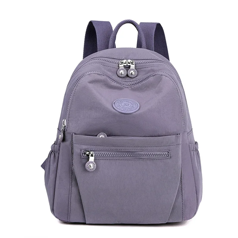 sac à dos léger en nylon pour femme, sac fourre-tout en nylon multi-poches, sac à dos décontracté imperméable pour les voyages, les trajets domicile-travail et l'usage quotidien