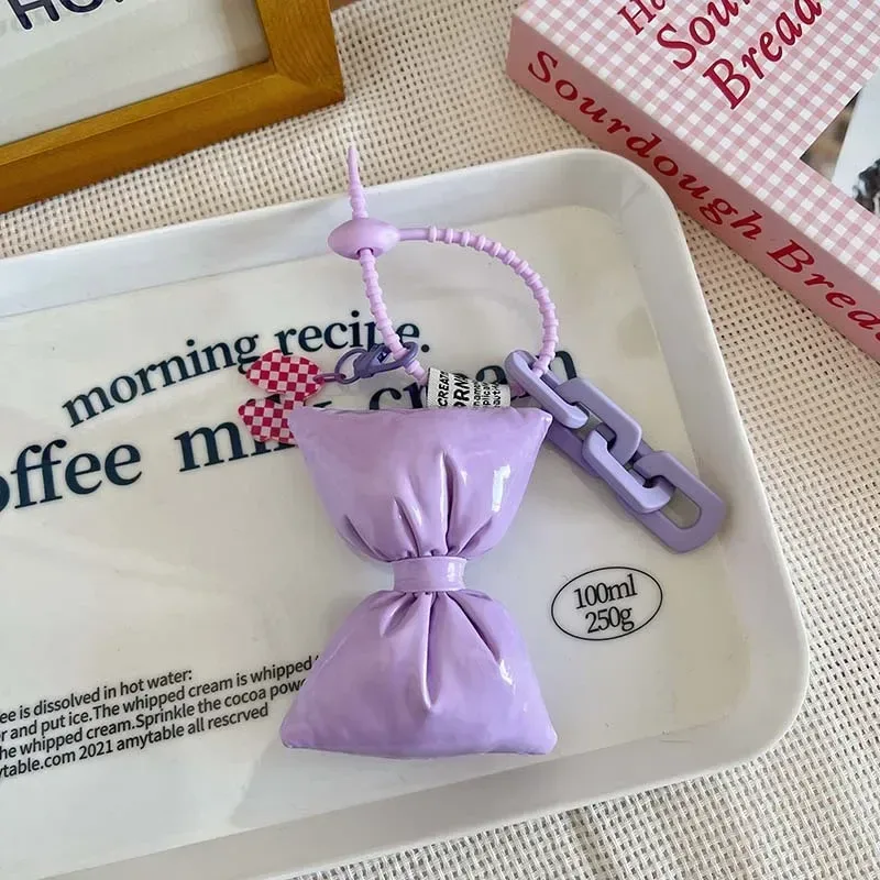 porte-clés en cuir et coton avec nœud doux pour fille, pendentif simple et mignon pour sac à dos, décoration de sacs