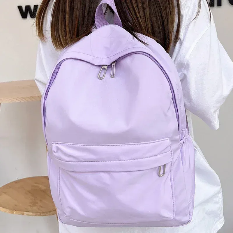 Haute qualité nouveau imperméable à l'eau en Nylon femmes sac à dos femme sac de voyage sacs à dos cartable pour adolescentes couleur unie Bookbag