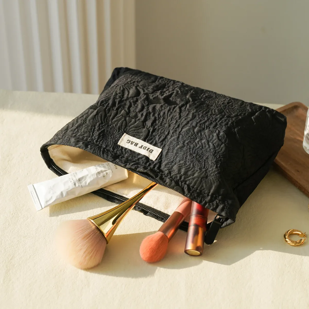 sac à cosmétiques en relief rose noir pour femmes, sac de voyage portable, sac de rangement de changement de cosmétiques de grande capacité, pochette de banlieue