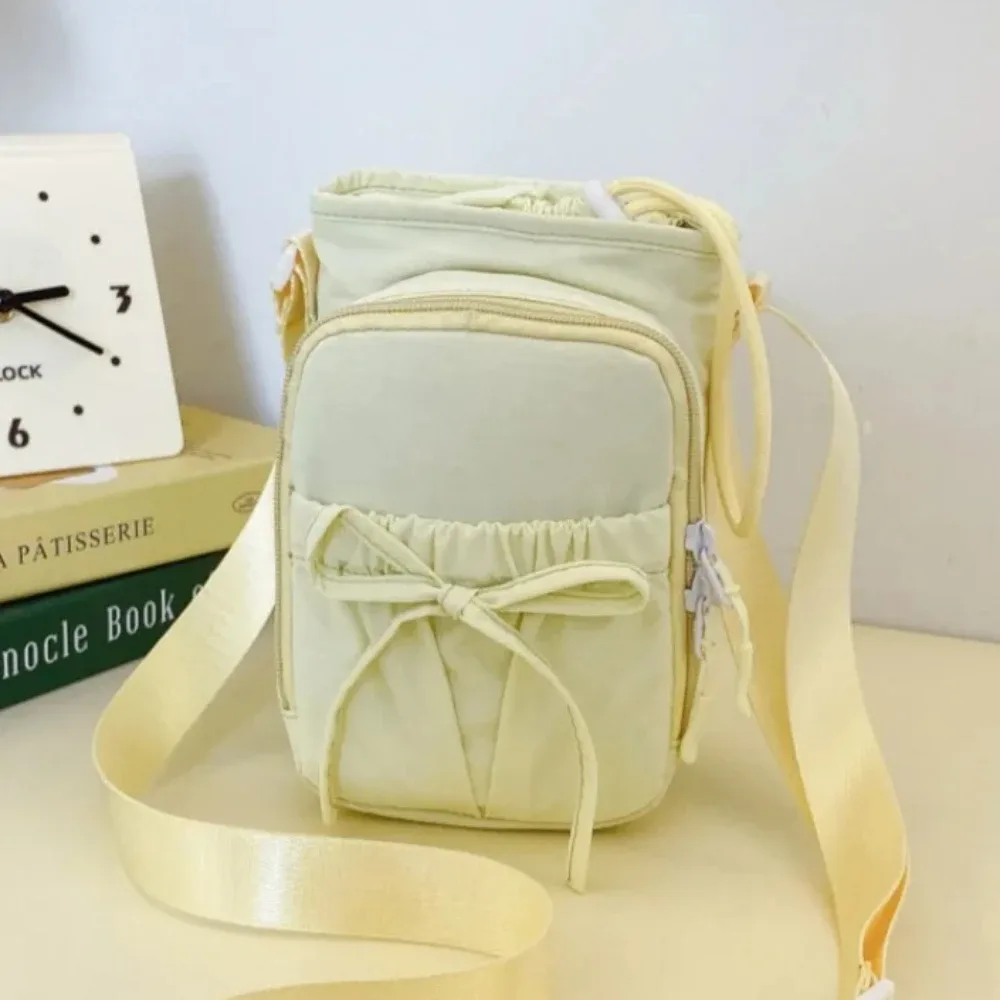 Nouveau sac bandoulière léger pour téléphone portable pour femme, sac de sport et cyclisme d'extérieur, porte-bouteille d'eau, sac de voyage, sacs à main au design noué