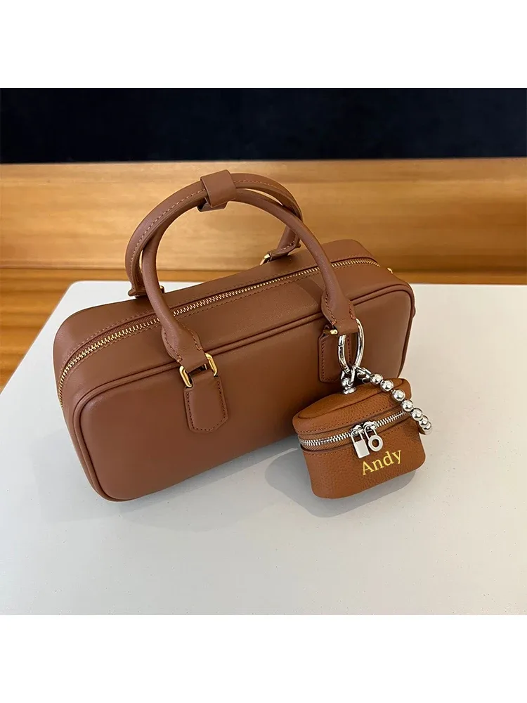 Lettres personnalisées gratuites sac en peau de vache charme petit porte-monnaie ins vent simple portable sac de cou rouge à lèvres organisateur sac écouteur sac