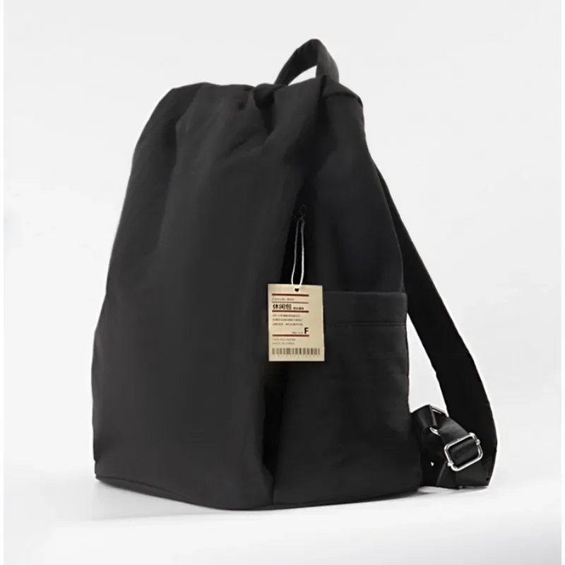 nouveau sac à dos décontracté imperméable style muji japonais 2026 grande capacité couleur unie minimaliste pour ordinateur portable hommes et femmes