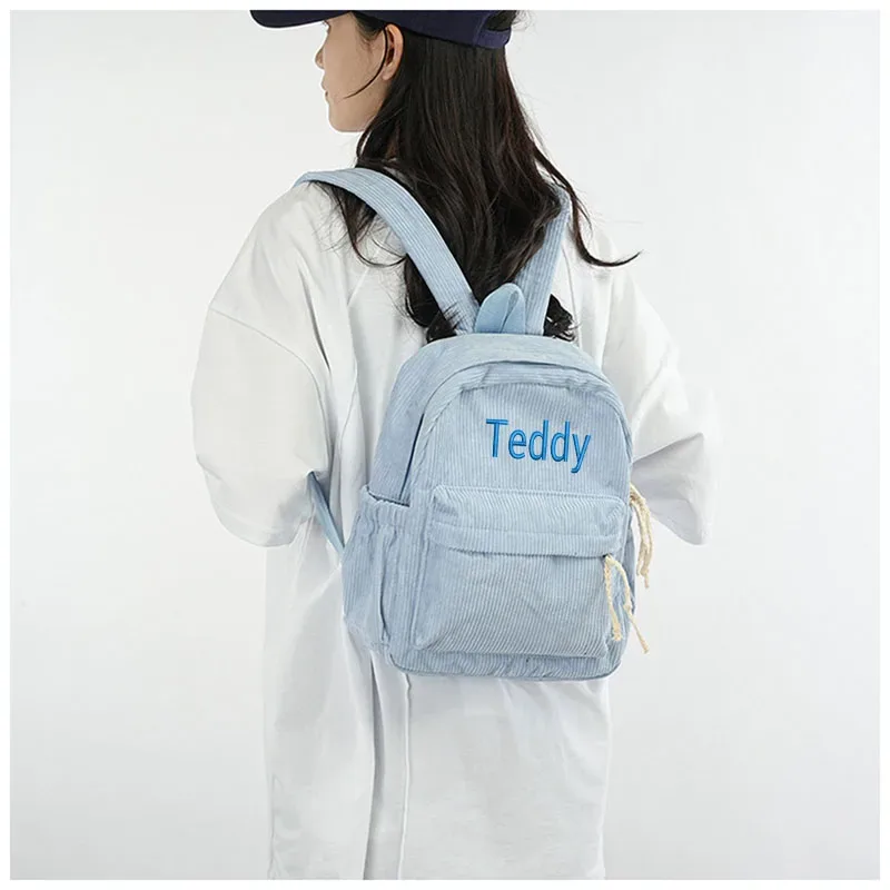 cartable personnalisé 2025 nouvelle mode velours côtelé fermeture éclair lisse nom unique personnalisé grande capacité sac à dos de voyage sac à dos de randonnée
