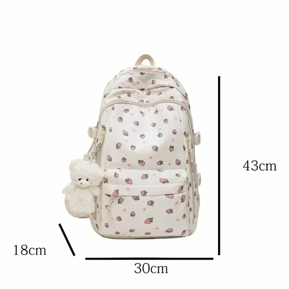 sac d'école en nylon pour étudiants, sac à dos de grande capacité de style preppy pour femmes avec pendentif, sac à dos de voyage à motif floral