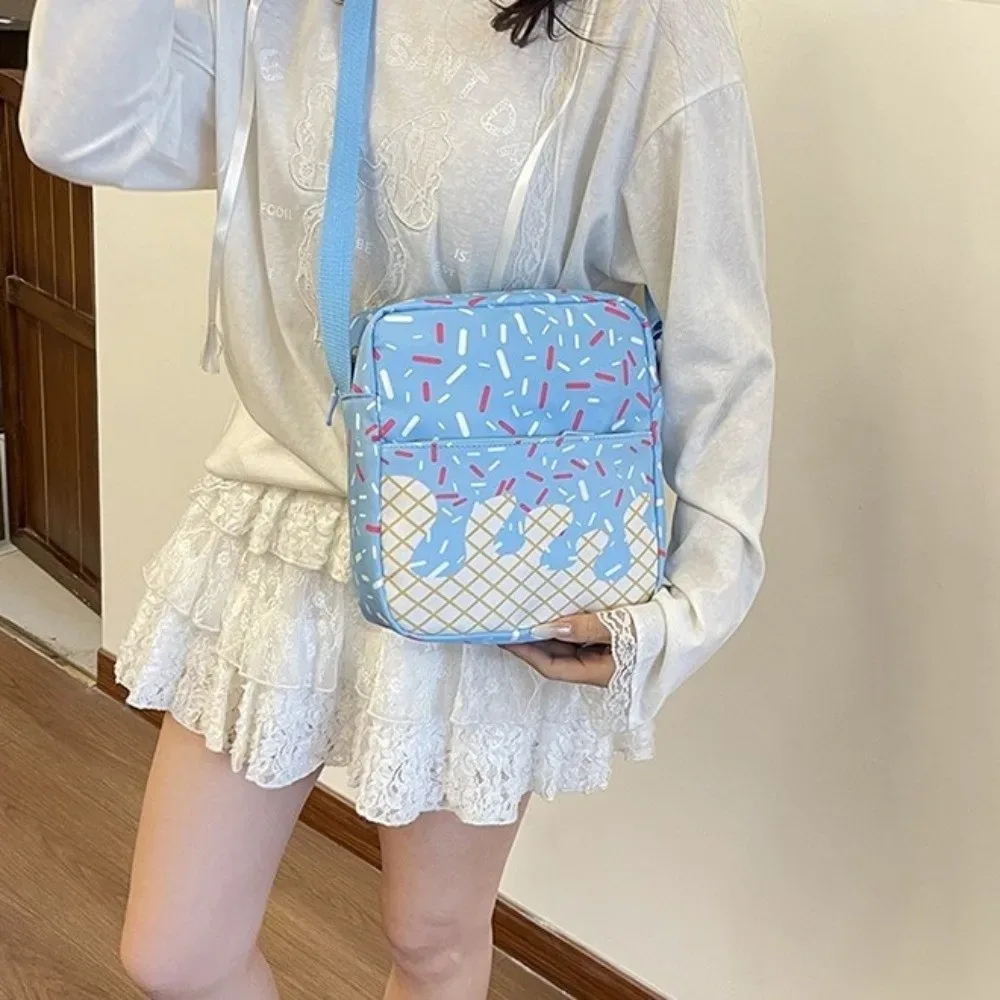 Ensemble de sacs à dos en tissu Oxford imprimé crème glacée avec trousse à crayons, sac à dos de grande capacité assorti à un sac bandoulière et un sac fourre-tout.