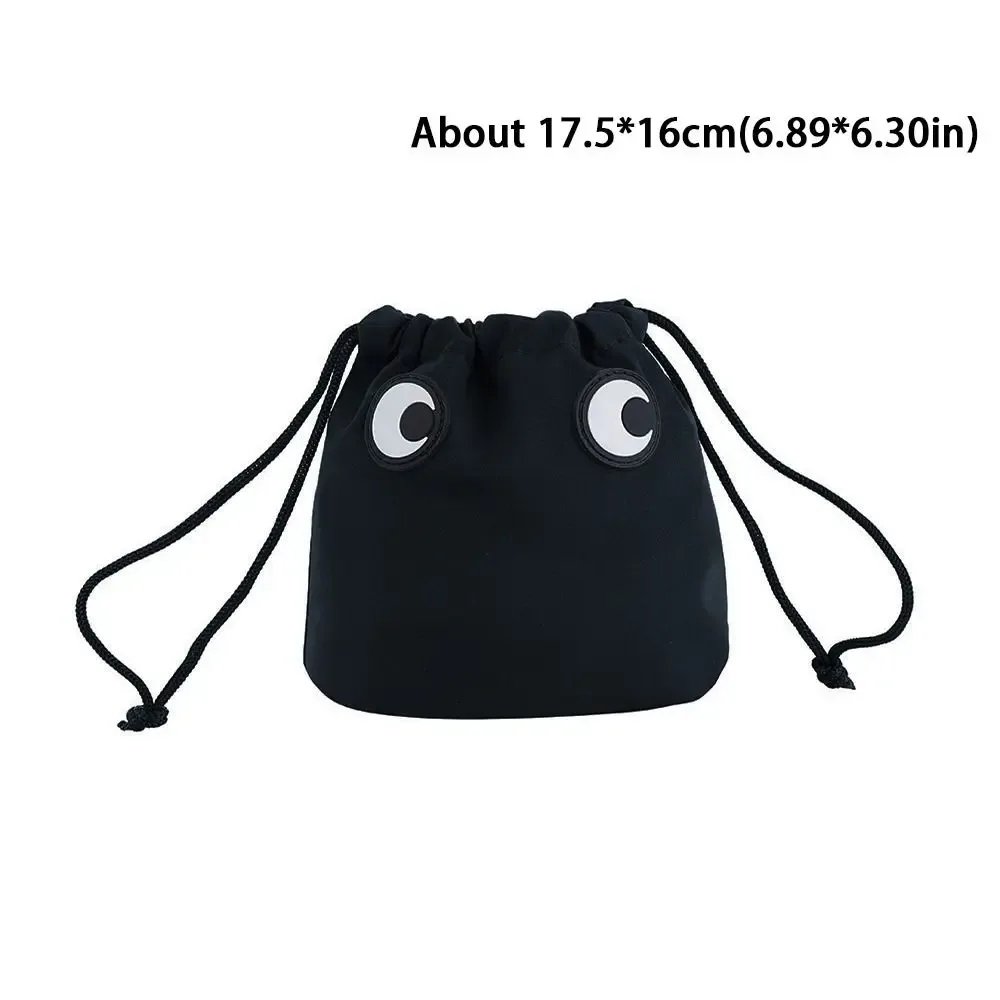 trousse de maquillage en nylon tendance avec cordon de serrage, motif dessin animé grands yeux, sac cosmétique mignon pour l'organisation des maquillages