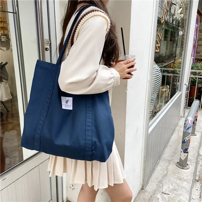 Sac à bandoulière en toile de coton pour femmes, sac à main Simple en tissu écologique, fourre-tout solide pour livres scolaires, sacs de Shopping portables pour filles
