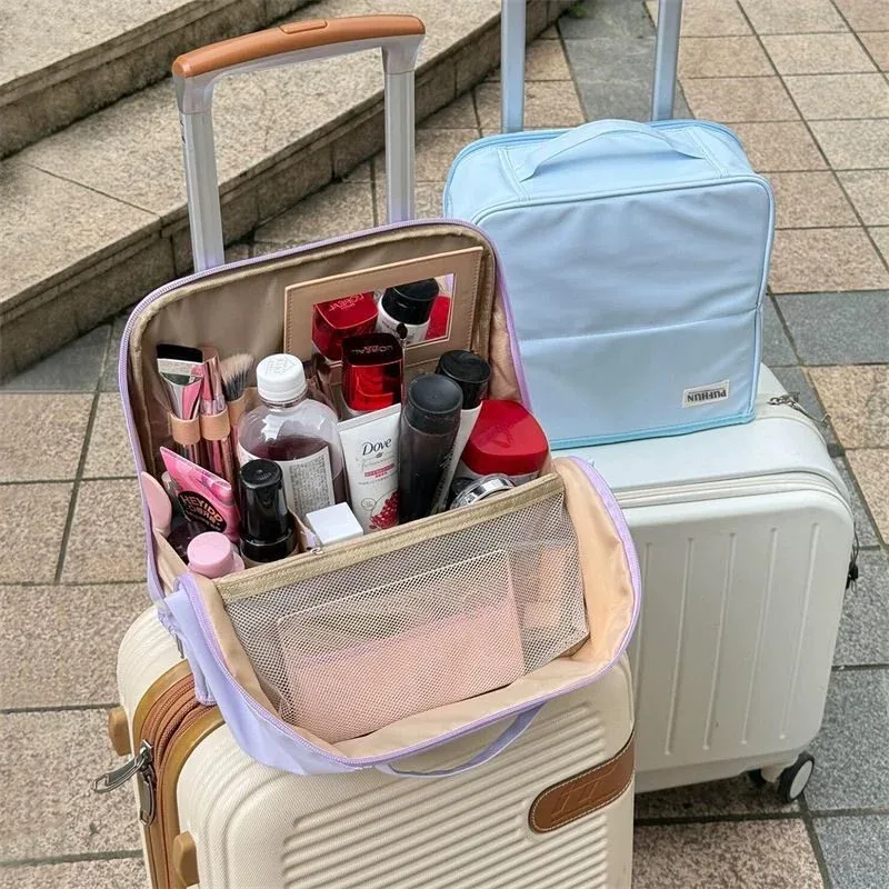 trousse de maquillage portable multifonctionnelle de grande capacité avec compartiments, miroir et fonction de maintien vertical pour les voyages et les articles de toilette