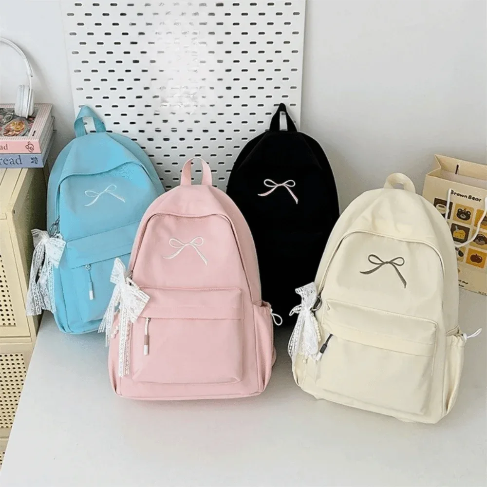 sac à dos pour filles avec nœud brodé, en nylon, grande capacité, léger, couleur unie, pour étudiants, sac d'école, sac de voyage