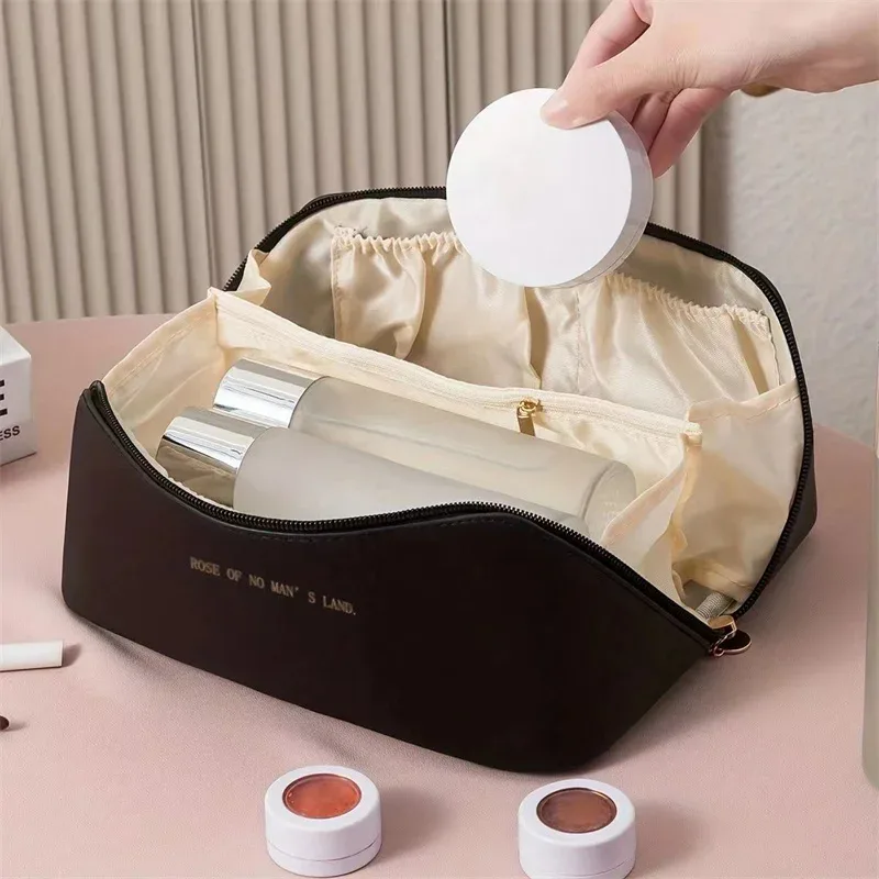 sac de maquillage pratique à la mode, sac de rangement de voyage en pu, trousse de toilette de grande capacité, sac de maquillage pour oreiller de beauté stimulant les mains