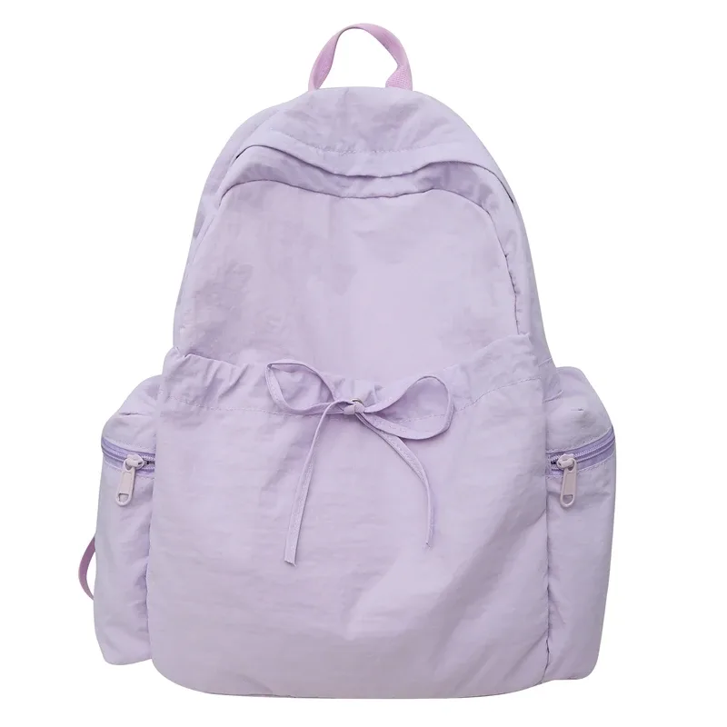 nouveau sac à dos mignon de couleur unie pour femmes, sac à dos de loisirs en nylon pour étudiantes, cartable pour adolescentes, sac à dos de voyage à la mode