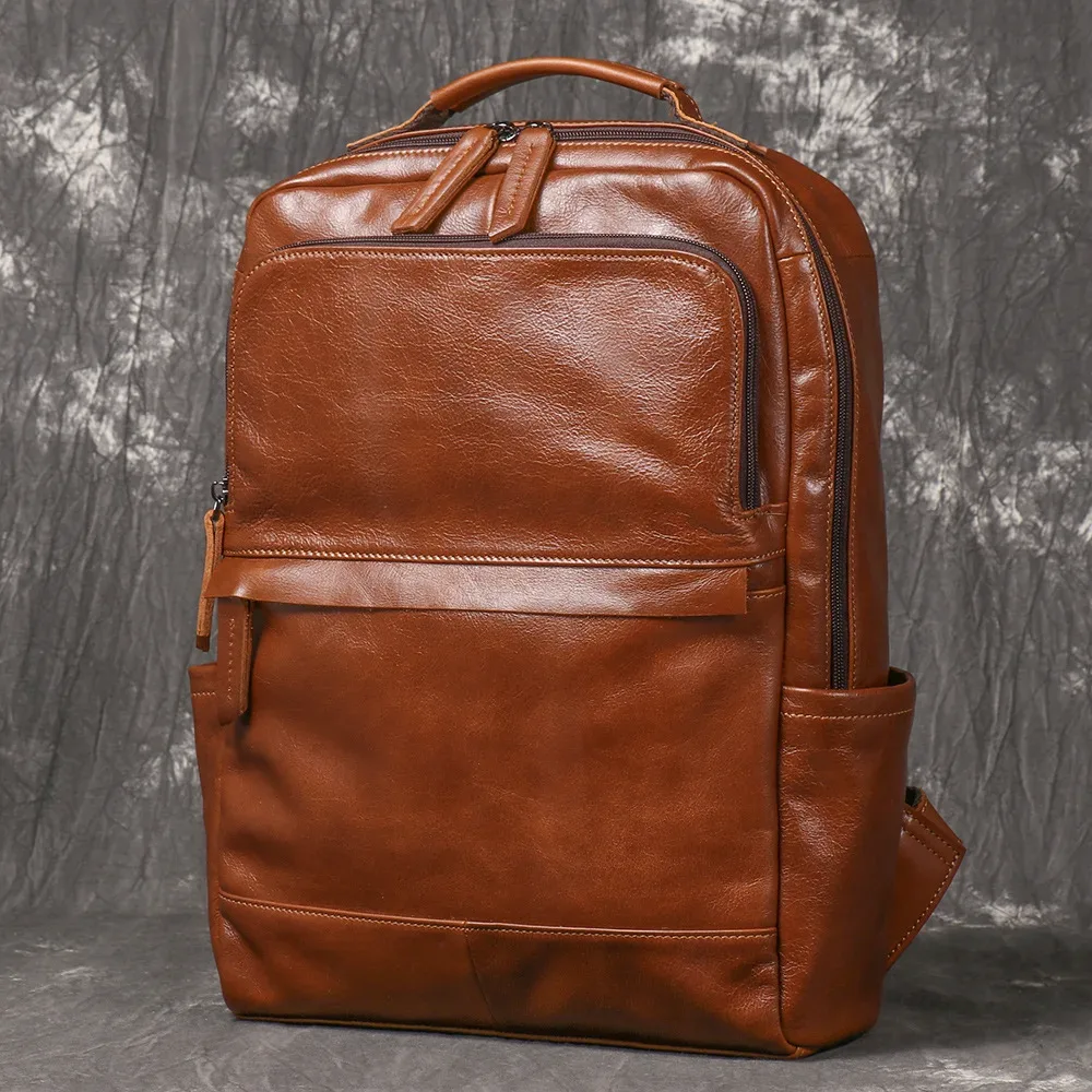 Sac à dos pour hommes couche de tête naturelle peau de vache Vintage bandoulière femmes sac à dos de voyage en plein air 15 pouces pochette d'ordinateur Leathfocus
