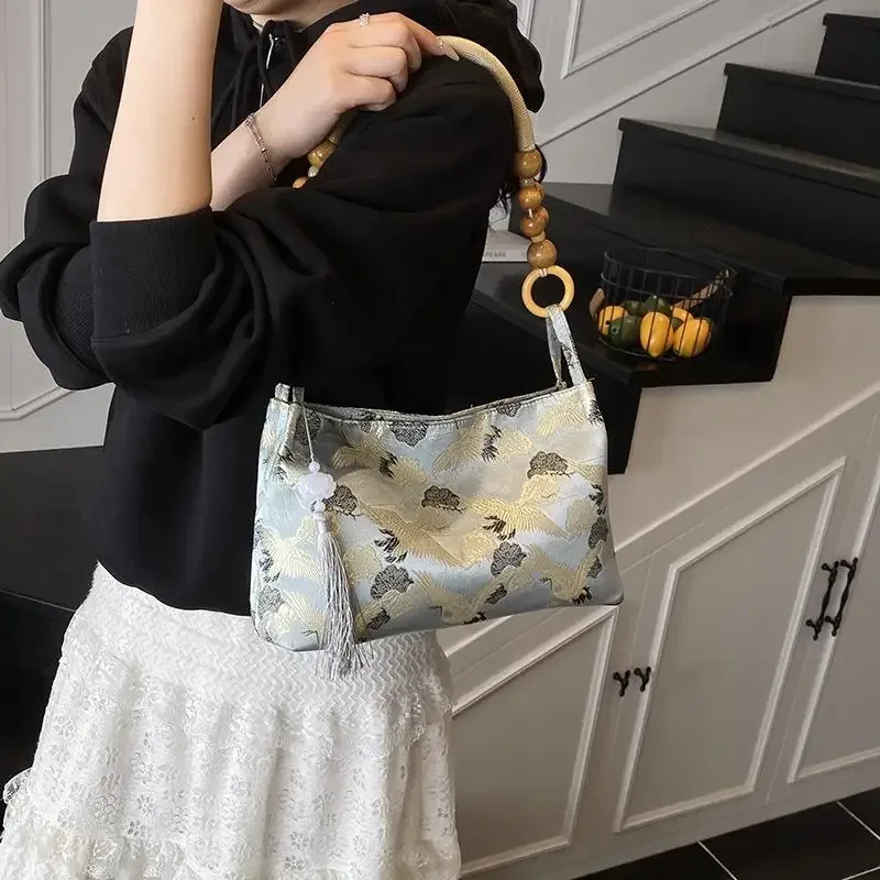 hasp fil à coudre brodé style national sacs à bandoulière gland décoration 2025 printemps nouvelle offre spéciale sacs à main pour femmes