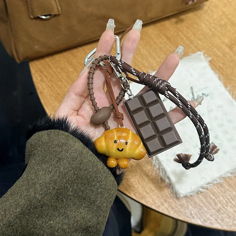 porte-clés mignon pain voiture sac à dos pendentif décoration nylon tissé adapté aux étudiants, couples, crochets pour clés