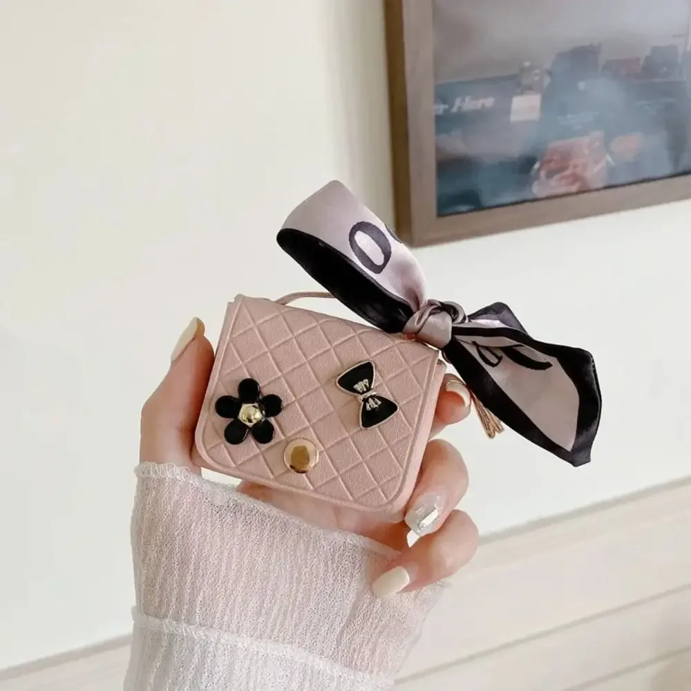NOUVEAU Étui de rangement pour écouteurs en cuir, mini porte-clés créatif, pendentif couleur unie, étui pour écouteurs Bluetooth