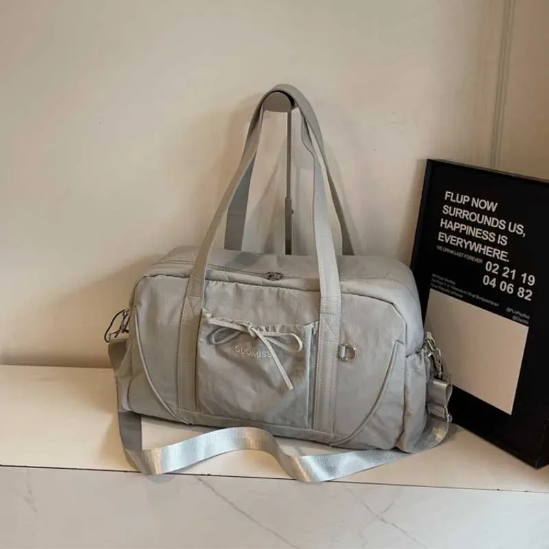 nouveau sac de voyage grande capacité épaule portable sac à bagages sac de rangement de voyage sacs d'embarquement sport fitness sacs pour femmes сумка