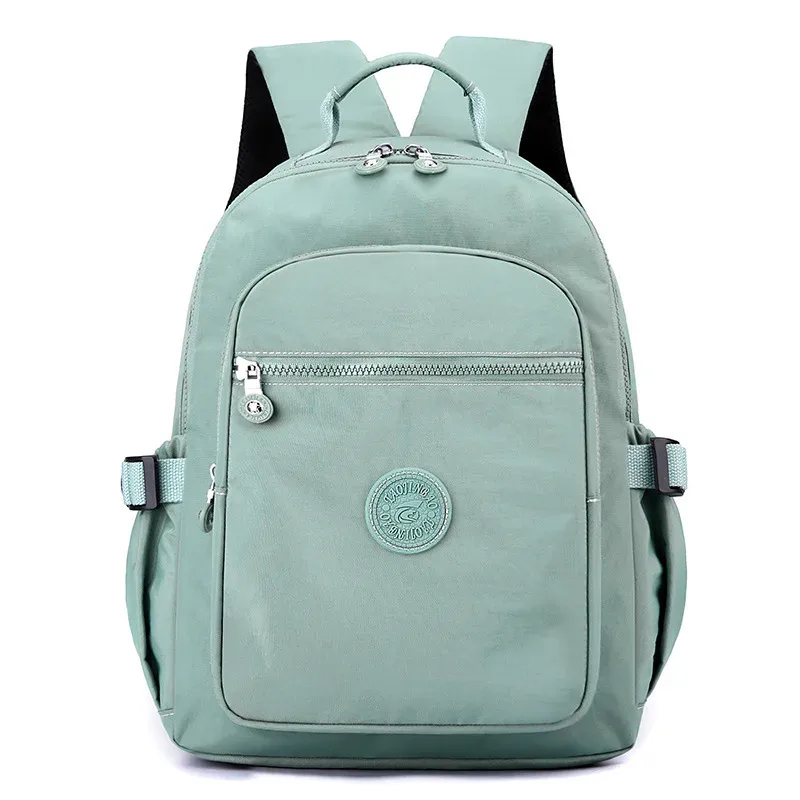 nouveau sac à dos de voyage pour femmes sac d'école en tissu nylon décontracté léger grande capacité à la mode double sacs à bandoulière en vente