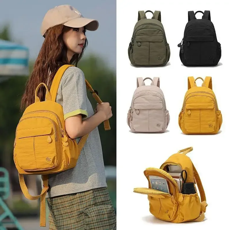 nouveau sac à dos léger et compact, minimaliste et tendance, résistant à l'eau, polyvalent pour les voyages, le sport, l'école et l'usage quotidien