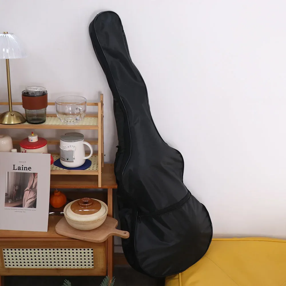 Sac de guitare à bandoulière réglable épaisse en tissu Oxford noir, sac à dos de guitare imperméable avec fermeture éclair, sac à bandoulière unique pour instruments.