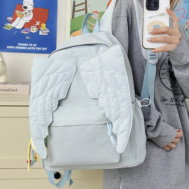 sac à dos pour femmes avec ailes d'ange, sac à dos en toile polyvalent pour filles, sac de voyage d'extérieur de grande capacité