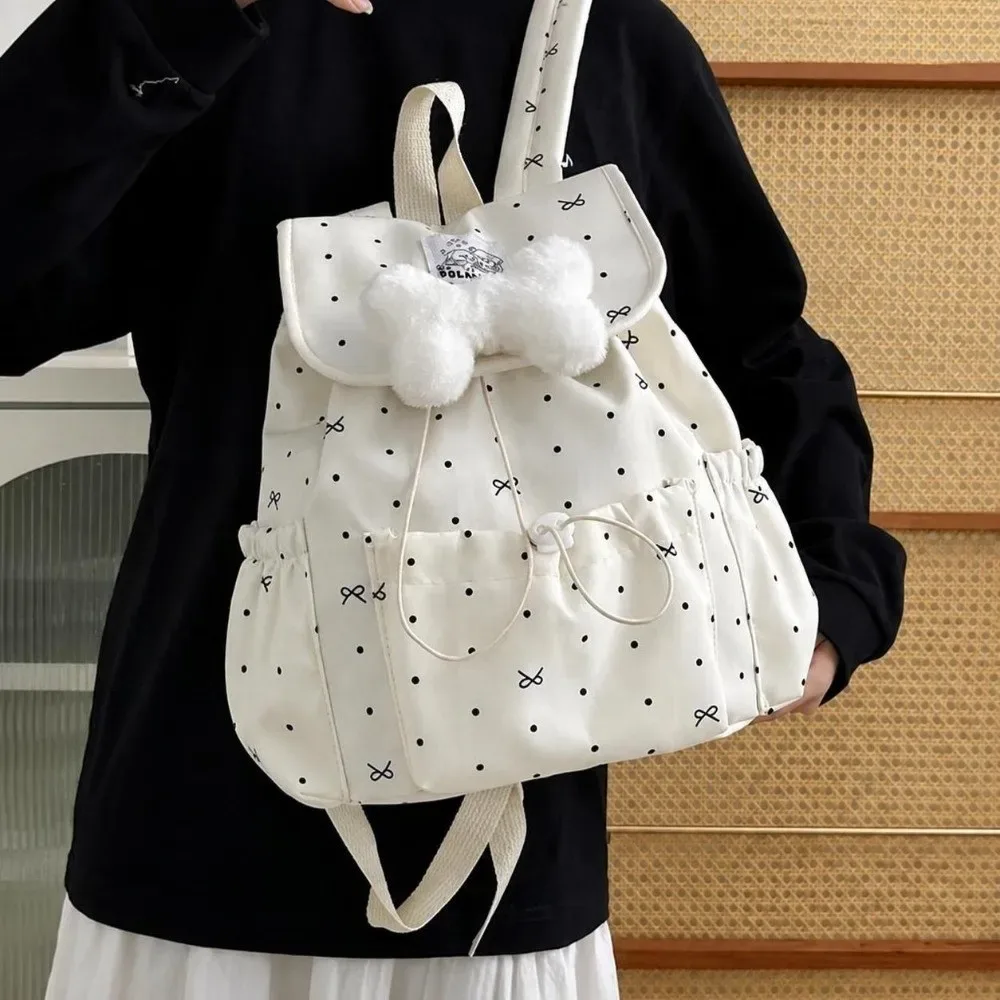 sac à dos à pois avec cordon de serrage, grande capacité, nœud décoratif, double bandoulière, ultra léger en nylon, idéal pour les trajets quotidiens et un usage décontracté.