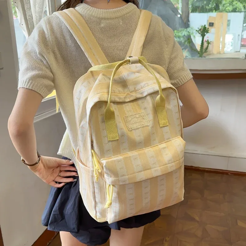 sac à dos en nylon à rayures et imprimé nœud pour femme, léger, mignon, pour étudiante, sac d'école, sac à dos de voyage quotidien pour ordinateur portable a4