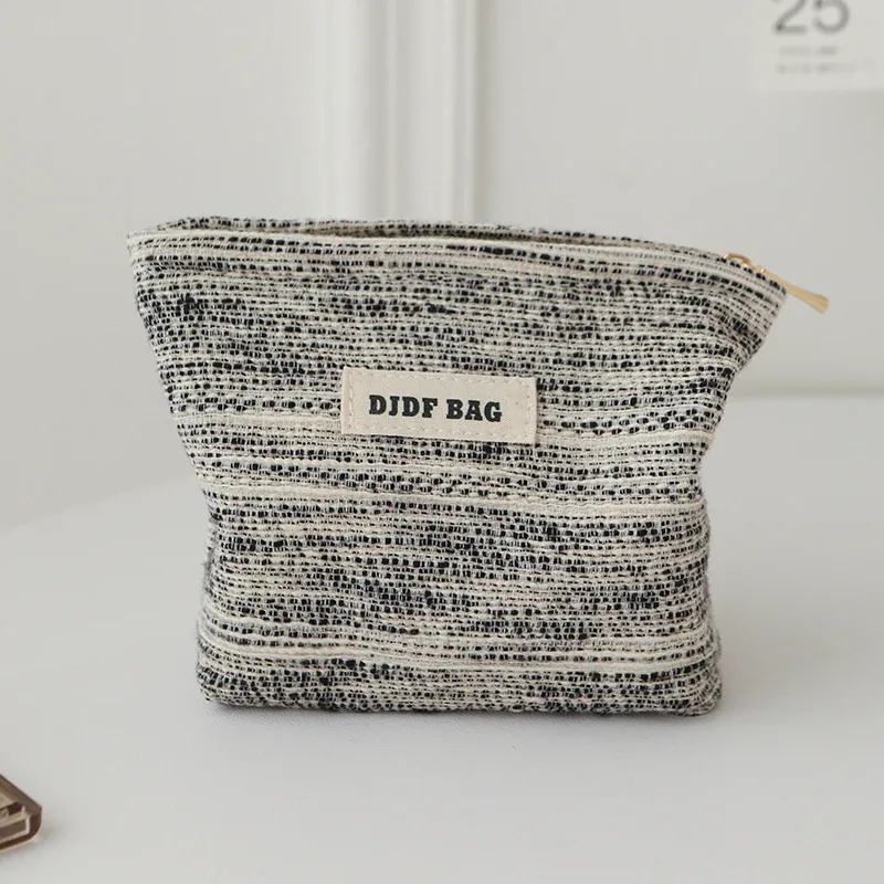 djdf – petit sac de maquillage pour femmes, ligne noir et blanc, sac de rangement de serviettes hygiéniques portables en toile avec fermeture éclair, porte-monnaie simple à main