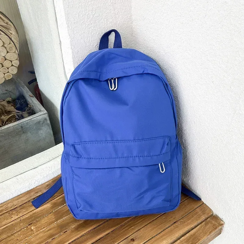 haute qualité nouveau imperméable à l'eau en nylon femmes sac à dos femme sac de voyage sacs à dos cartable pour adolescentes couleur unie bookbag