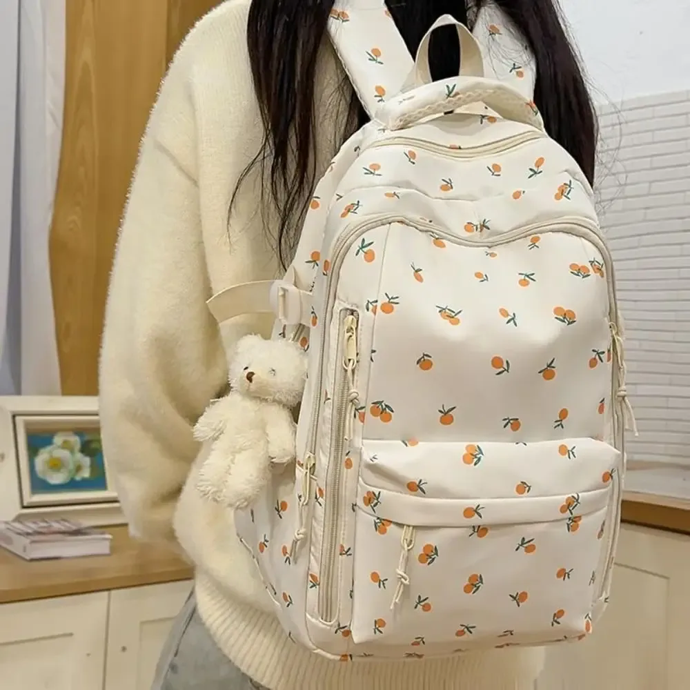 Sac d'école en nylon pour étudiants, motif floral, style preppy, sac à dos pour femmes avec pendentif, grande capacité, sac à dos de voyage