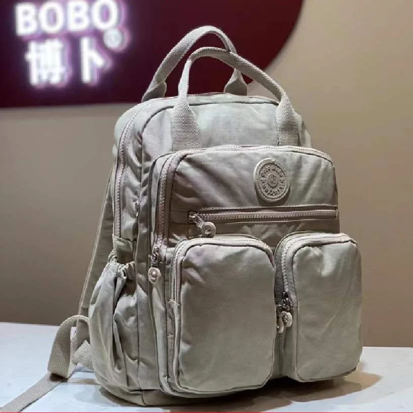 sac à dos imperméable en nylon pour femmes, poignée souple, solide, multi-poches, fermeture éclair, sacs d'école pour ordinateur portable, 2023