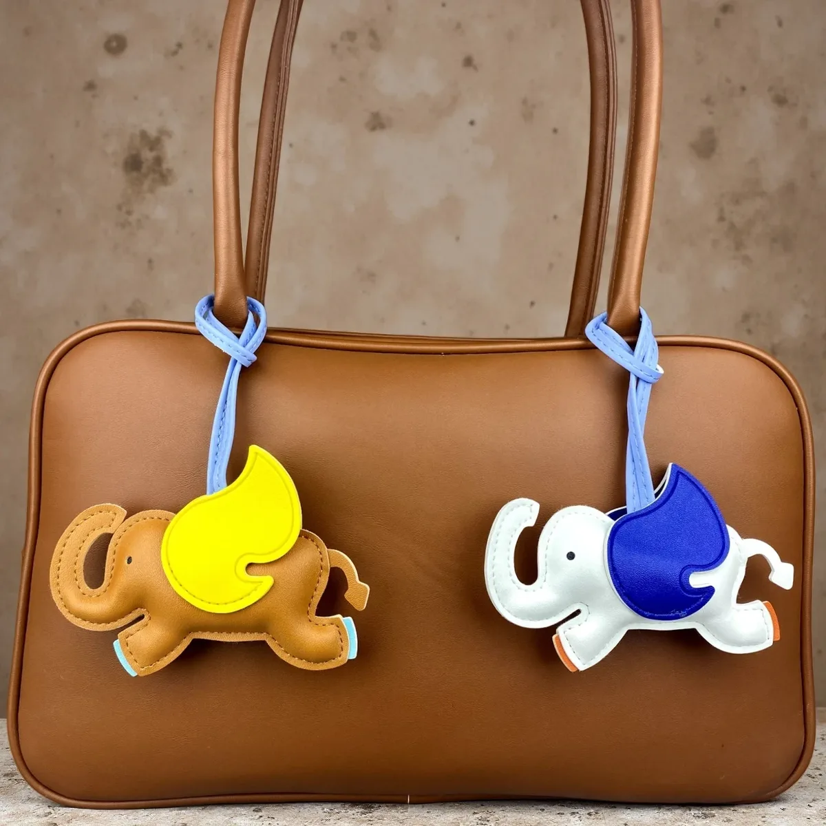 breloque amusante en cuir pu représentant un éléphant volant dumbo, pendentif animal pour sac à main, sac à dos, cadeau pour les amoureux des animaux, style bohème.