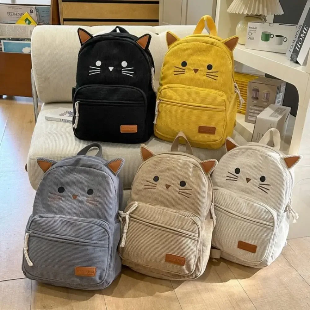 Sac à dos mignon en velours côtelé imprimé multicolore motif chat de dessin animé, avec plusieurs poches, léger, idéal pour les étudiants et les voyages.